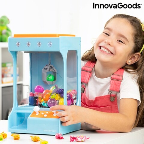 Aparat cu luminite si muzica pentru bomboane si jucarii SurPrize InnovaGoods